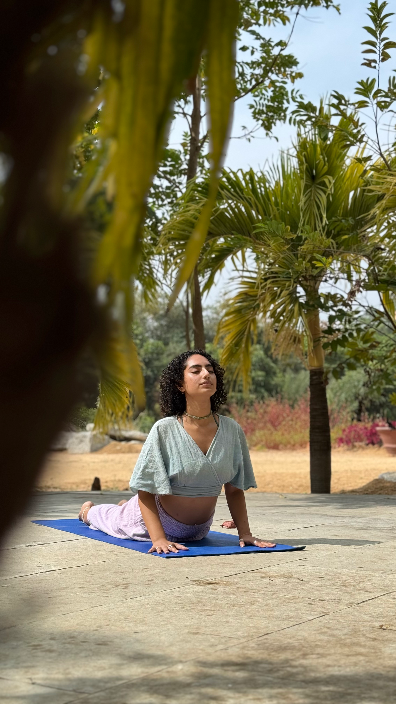 UMA guiding an outdoor yoga practice
