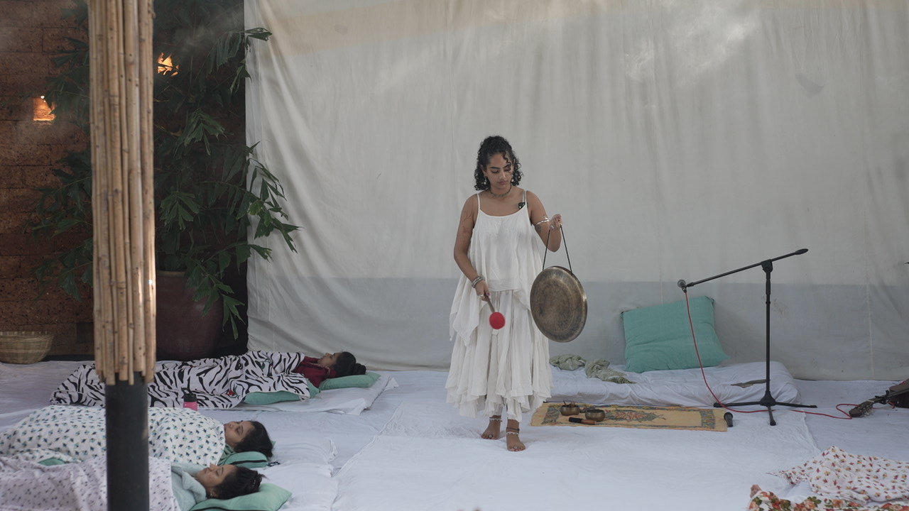 UMA guiding a restorative sound healing session