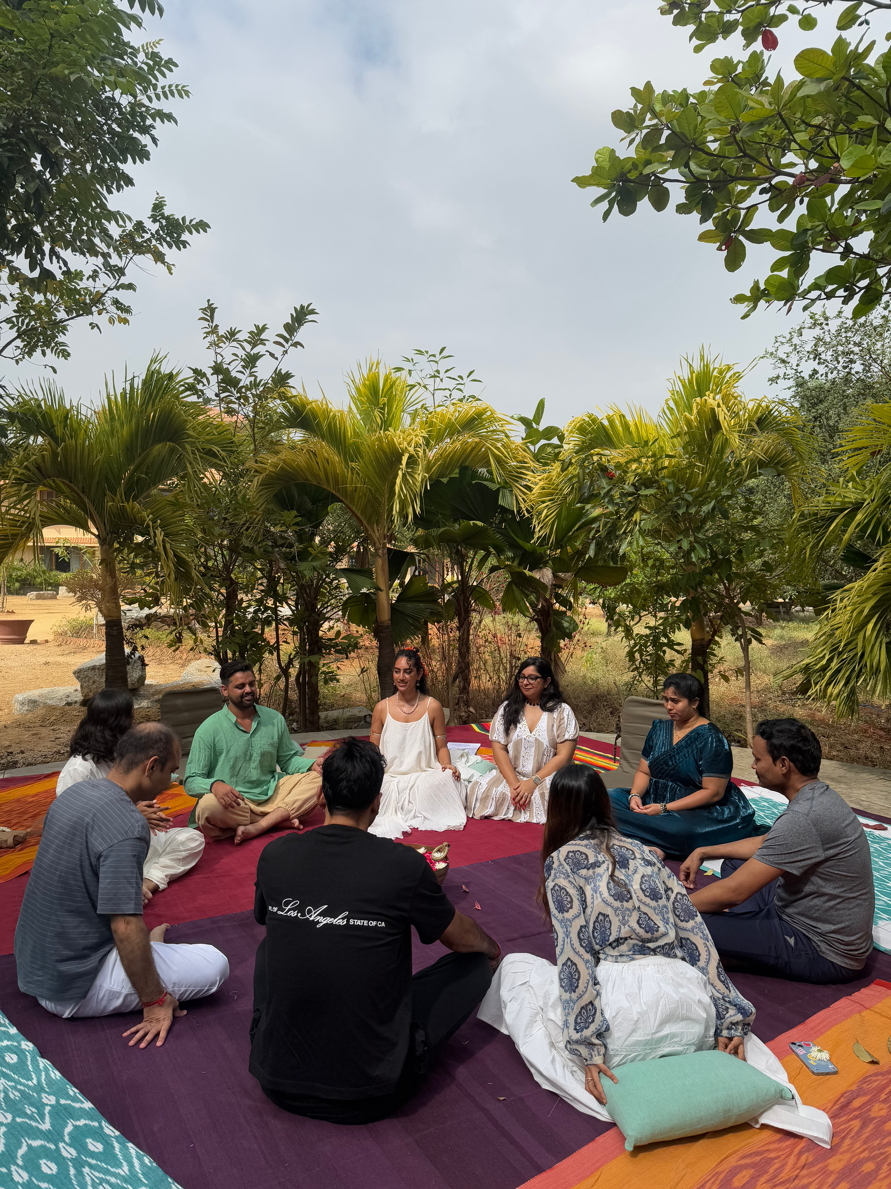 People taking part in an outdoor sharing circle